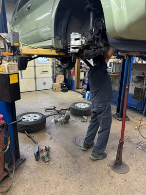 Technician Working under car